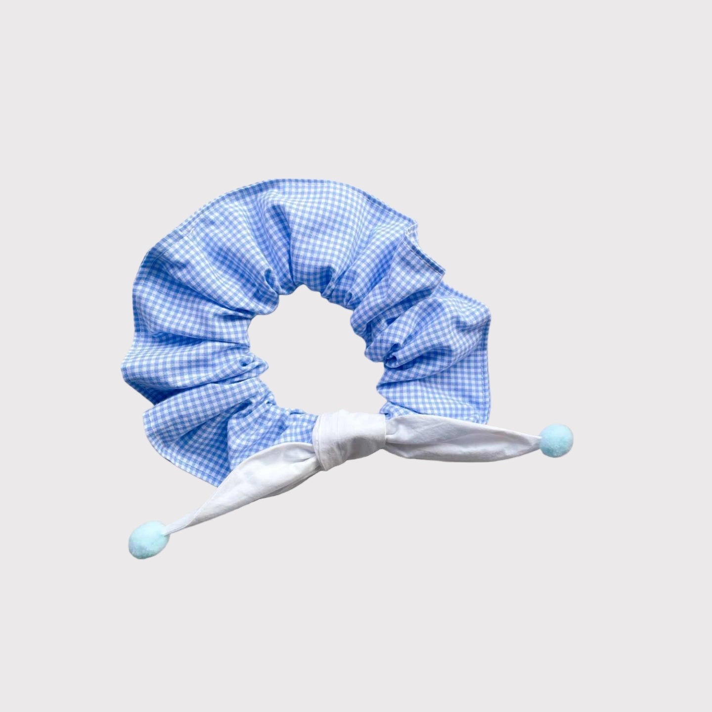 Pawful Moments adorable blue gingham pet bowtie bandana with green bowtie and pink pom-poms for dogs and cats